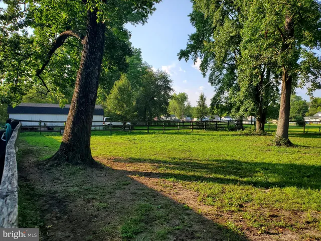 a view of a golf course with a garden