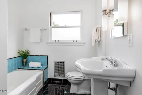 a bathroom with a sink and a toilet