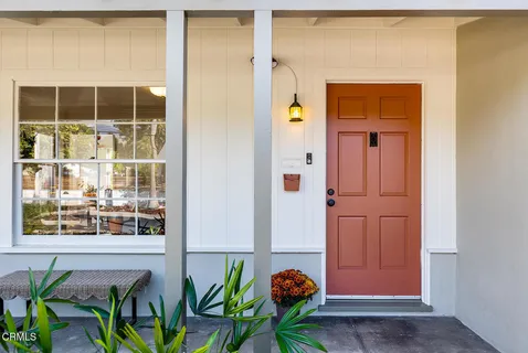 a view of front door and bedroom