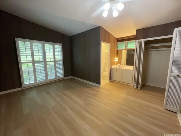 a bathroom with a double vanity sink and mirror