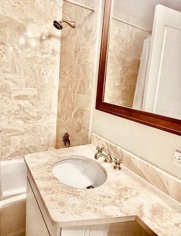 a view of a lake with a building in the background