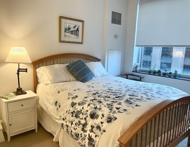 a view of swimming pool with a yard