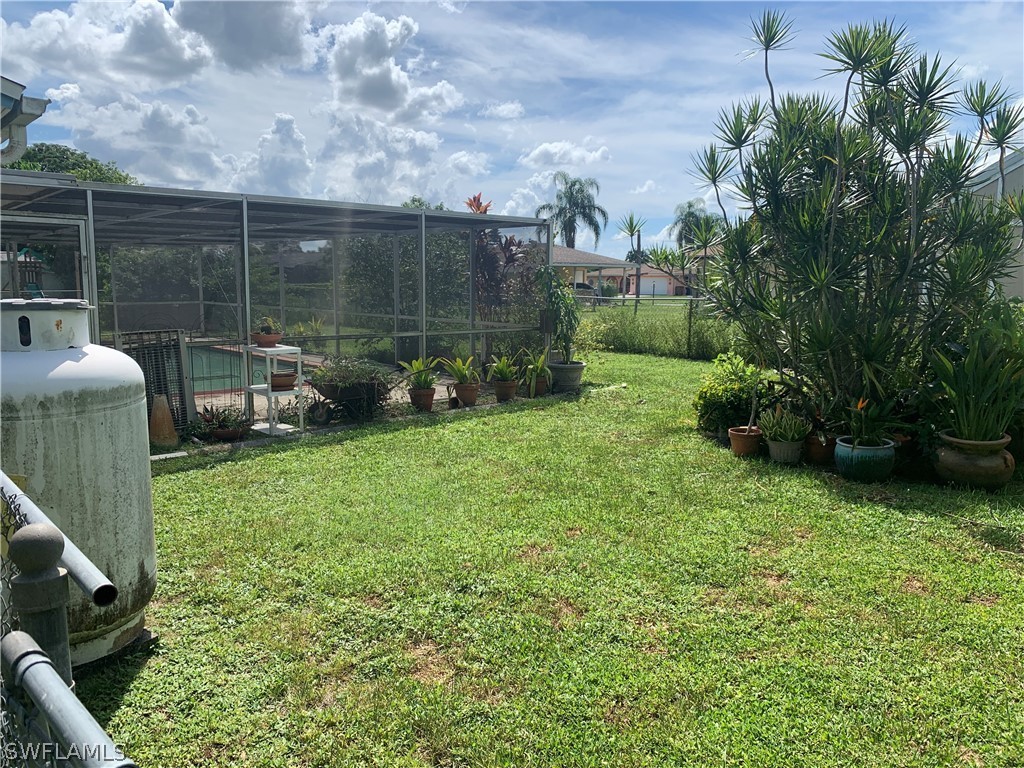 119 Rowland Road Lehigh Acres, FL 33936 - Photo 19 of 20 a view of a garden