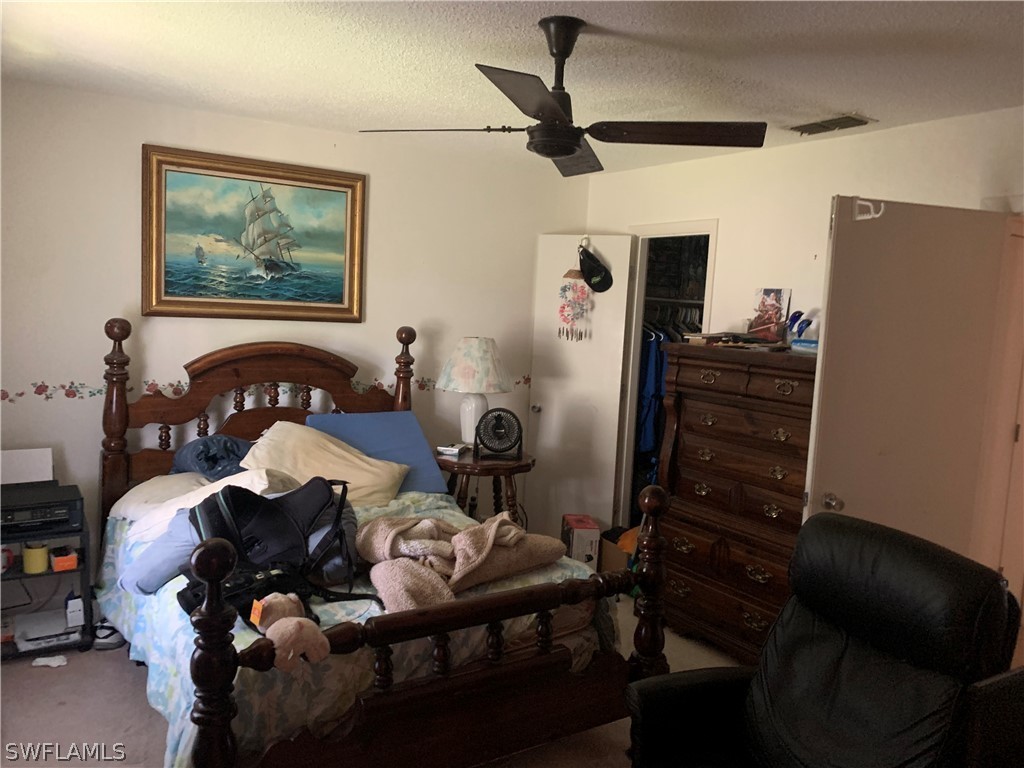 119 Rowland Road Lehigh Acres, FL 33936 - Photo 7 of 20 a living room with furniture