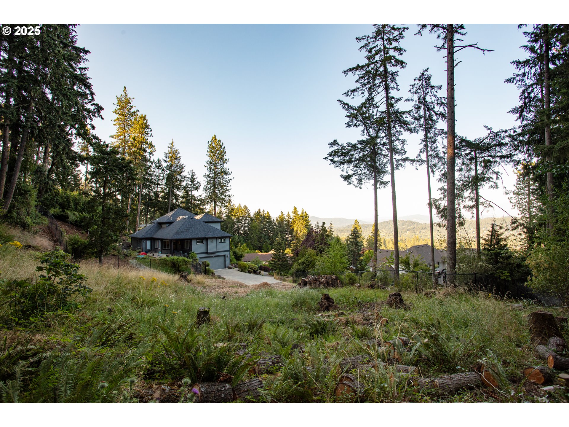 Pine View Eugene, OR 97405 - Photo 12 of 18 a backyard of a house with table and chairs