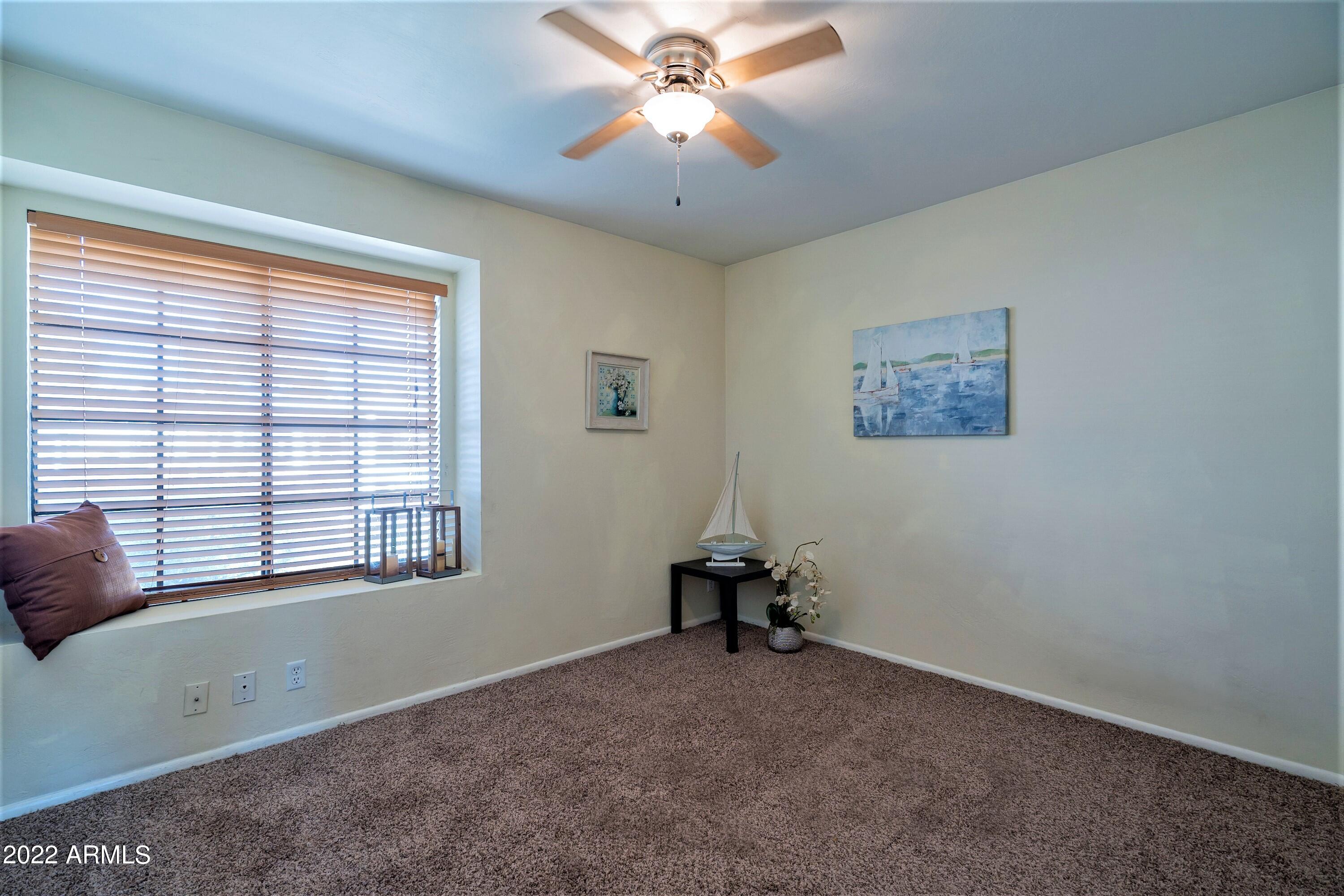 2455 East Broadway Road, Unit 19 Mesa, AZ 85204 - Photo 16 of 26 Guest Bedroom with Window Seat