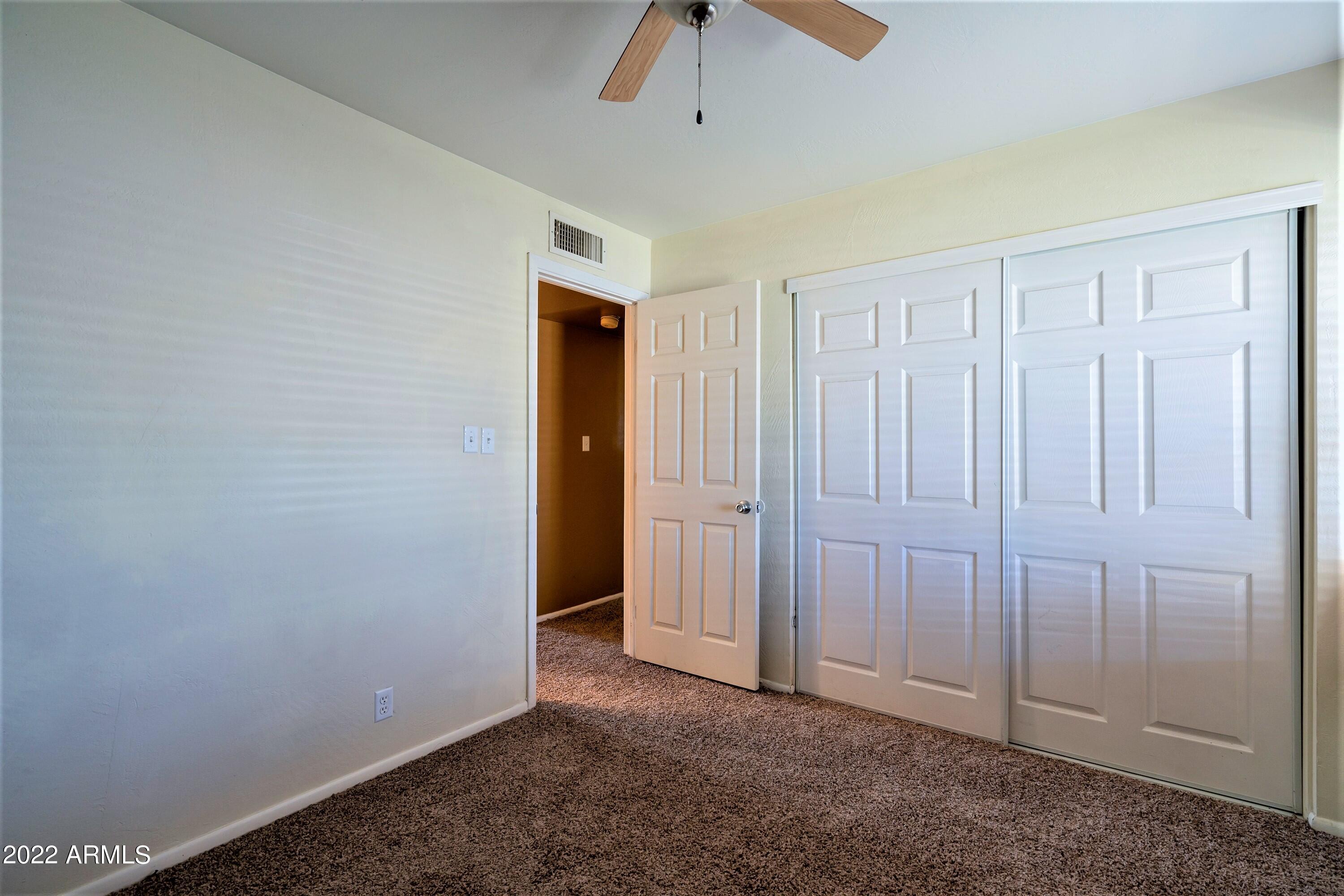 2455 East Broadway Road, Unit 19 Mesa, AZ 85204 - Photo 17 of 26 Guest Bedroom
