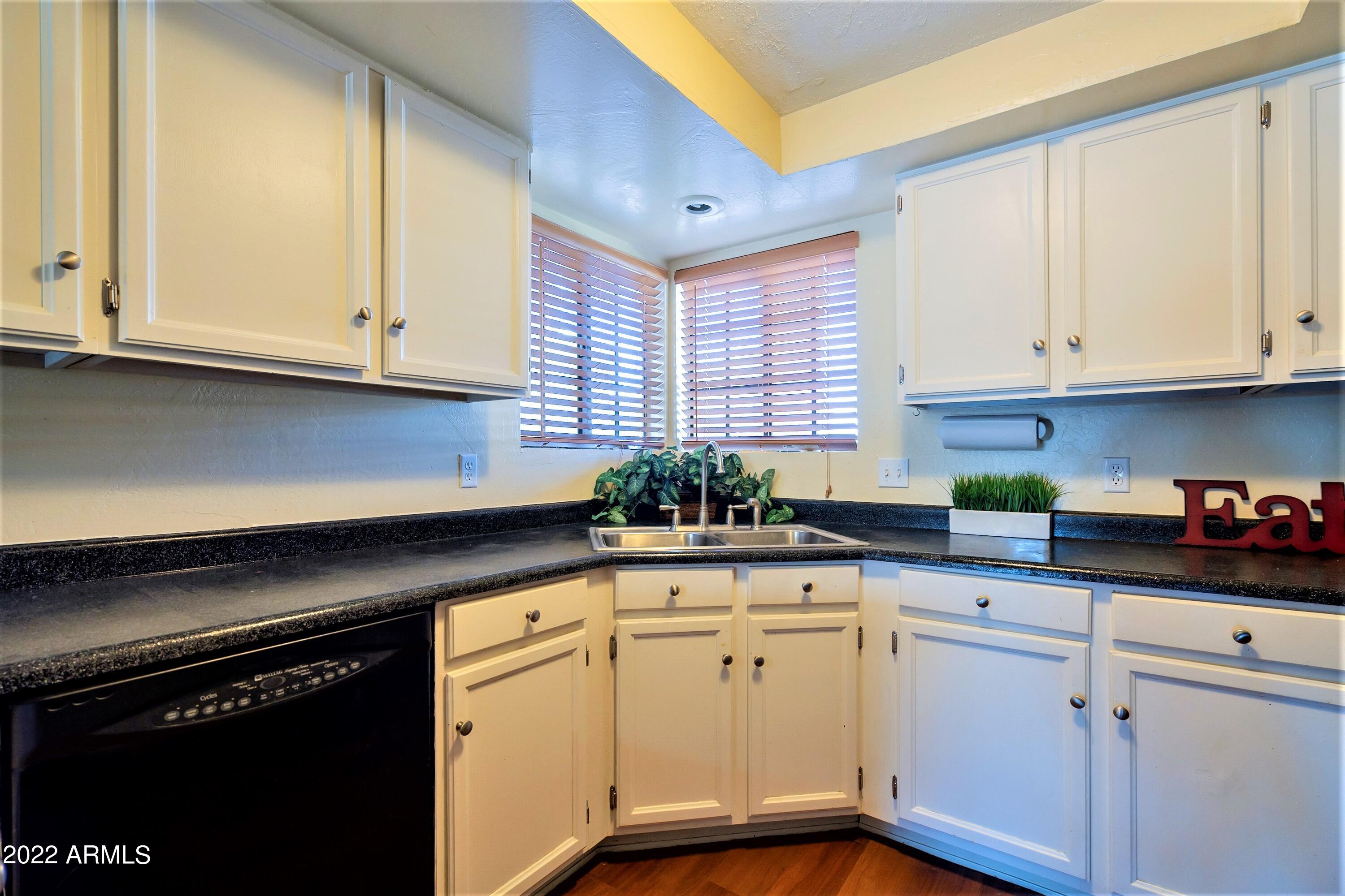 2455 East Broadway Road, Unit 19 Mesa, AZ 85204 - Photo 9 of 26 Kitchen with White Cabinets