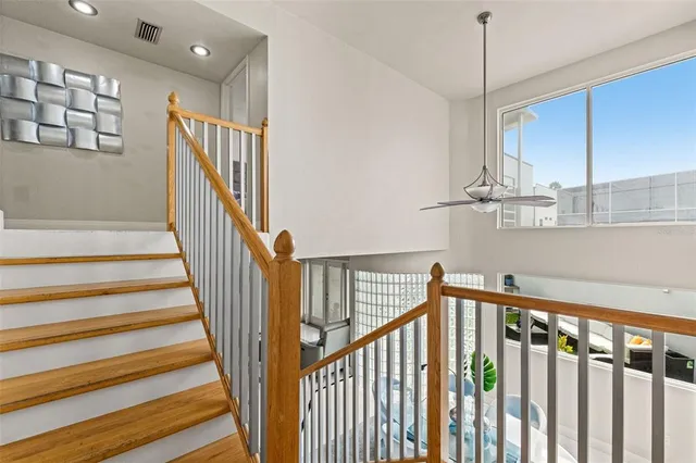 a view of a hallway with a kitchen