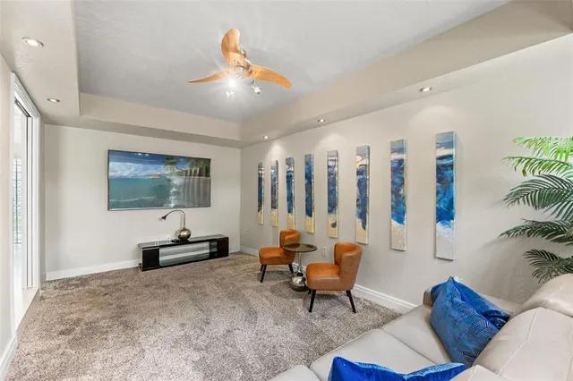 a bedroom with a large bed and a large window