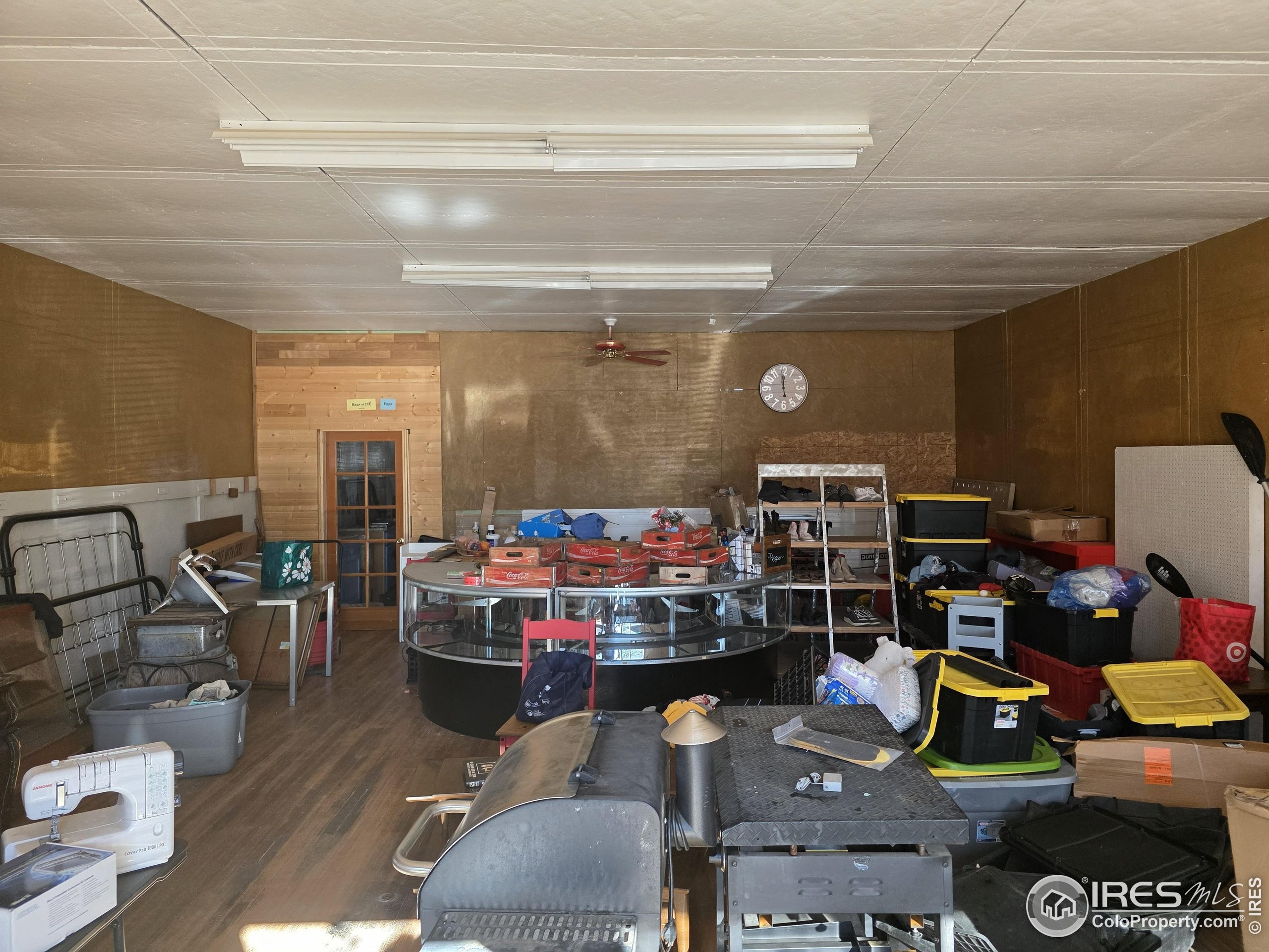 713 Front Street Arriba, CO 80804 - Photo 2 of 4 a room with lots of furniture and clutter