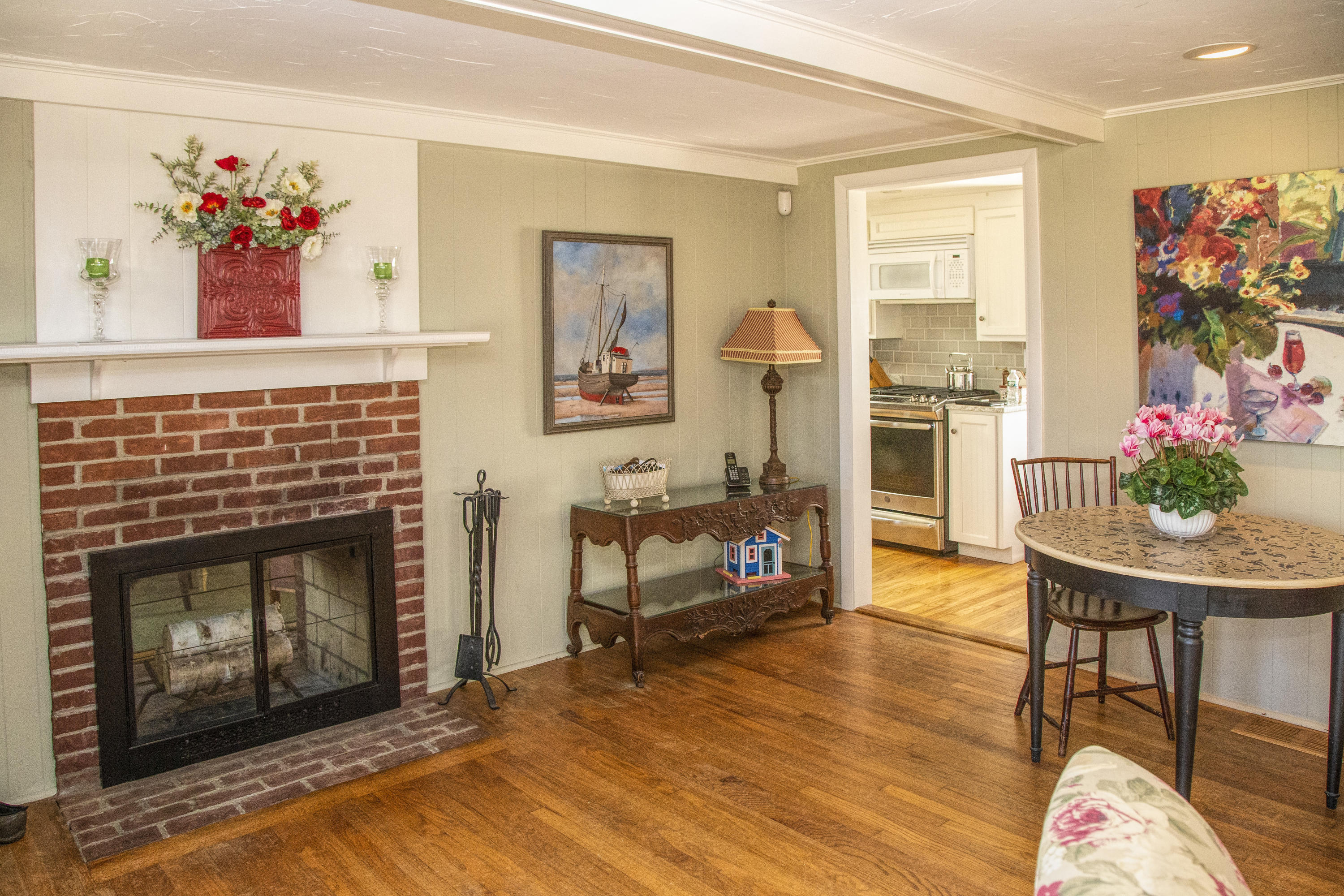 58 Aunt Debbys Road Dennis Port, MA 02639 - Photo 17 of 38 a living room with furniture and a fireplace