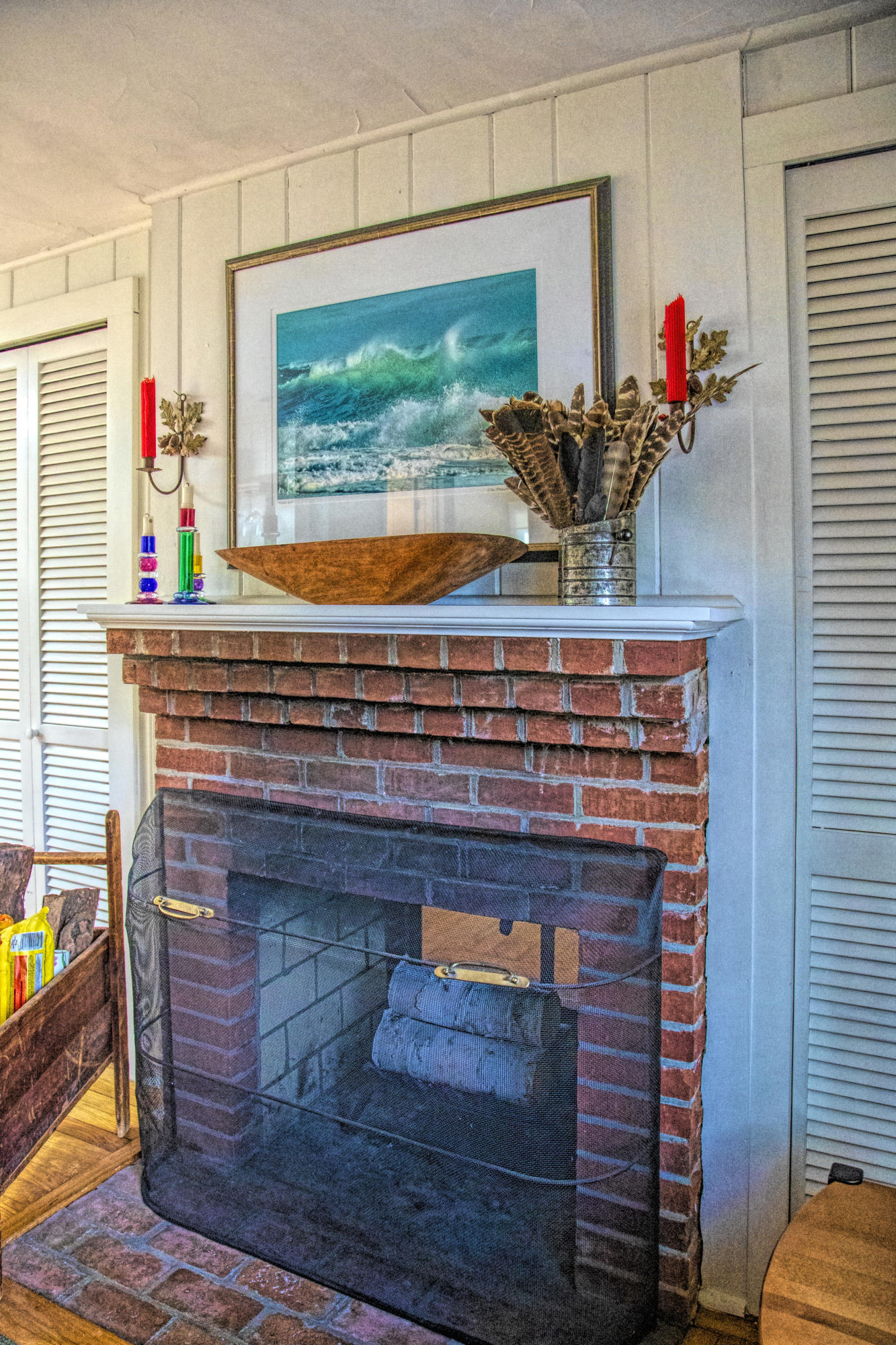 58 Aunt Debbys Road Dennis Port, MA 02639 - Photo 24 of 38 a living room with table chairs and a fireplace