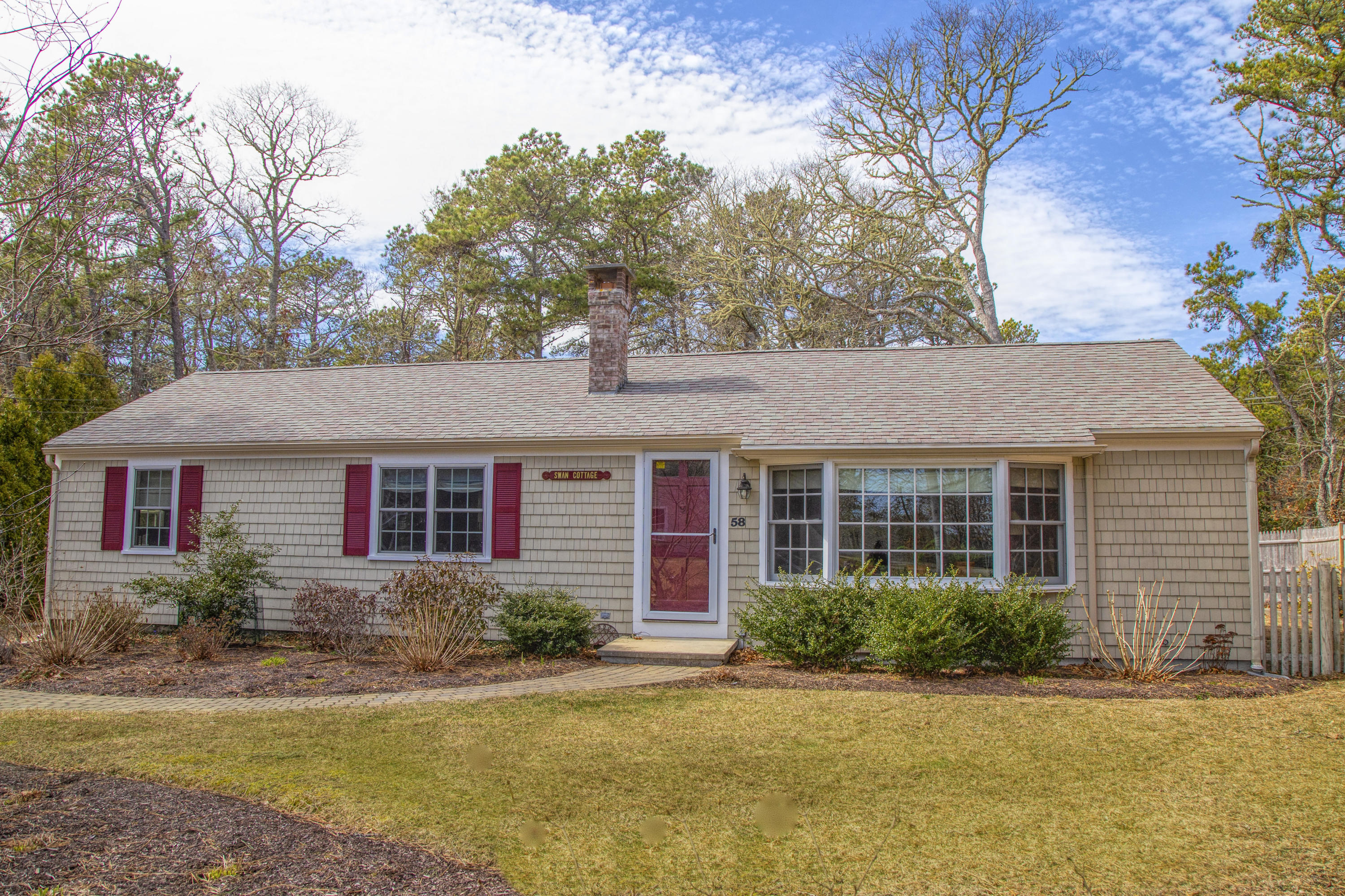 58 Aunt Debbys Road Dennis Port, MA 02639 - Photo 3 of 38 a view of a house with a yard and potted plants
