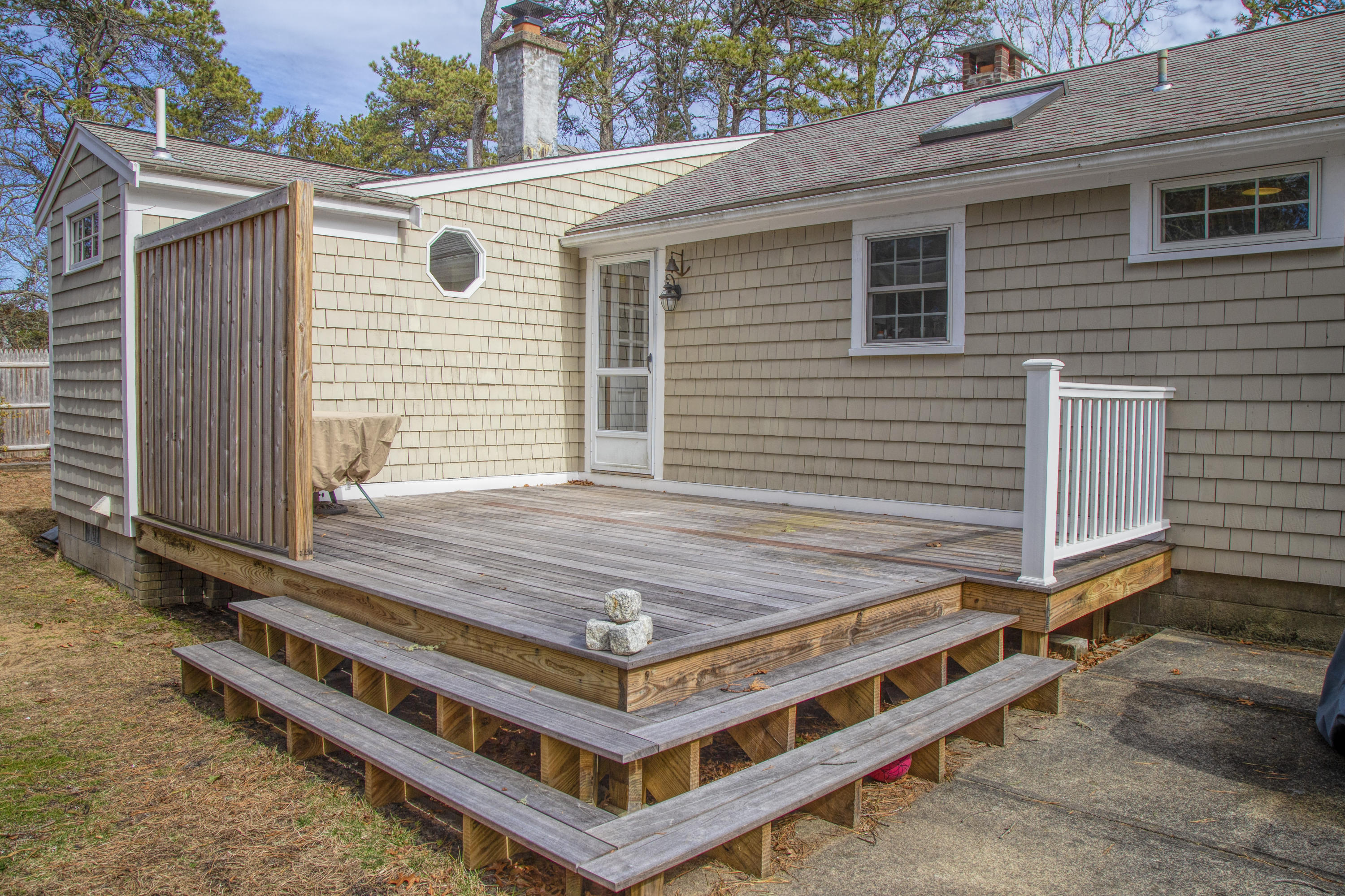 58 Aunt Debbys Road Dennis Port, MA 02639 - Photo 8 of 38 a view of a couches with a house