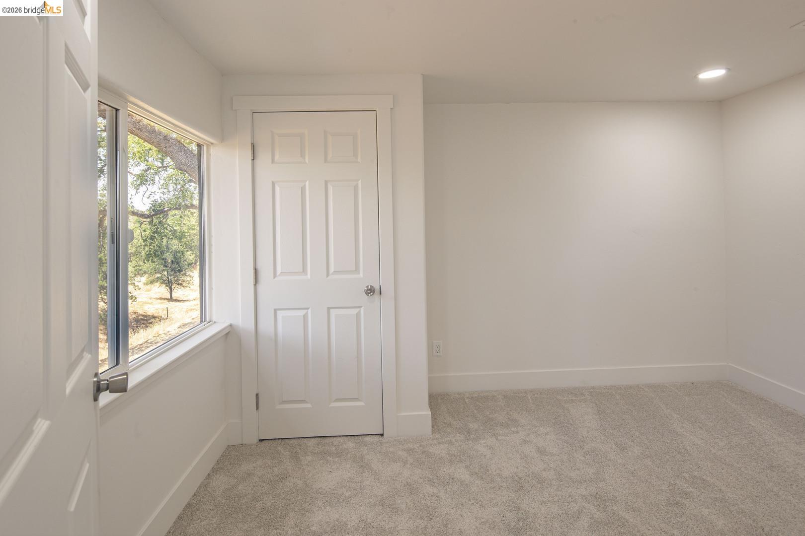 14594 Perricone Road Jamestown, CA 95327 - Photo 25 of 39 an empty room with windows