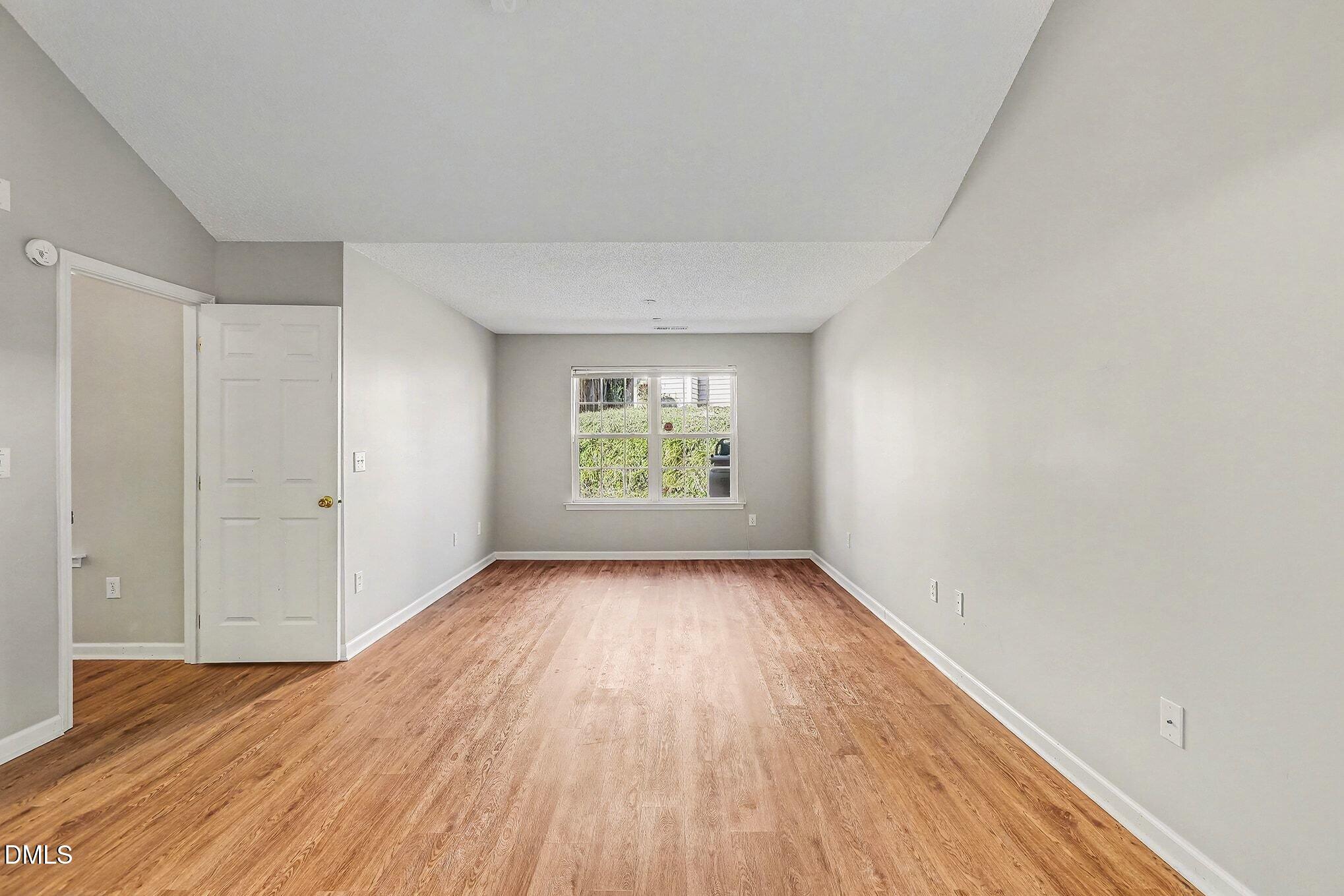5017 Tapestry Terrace Durham, NC 27713 - Photo 13 of 28 a view of an empty room and window