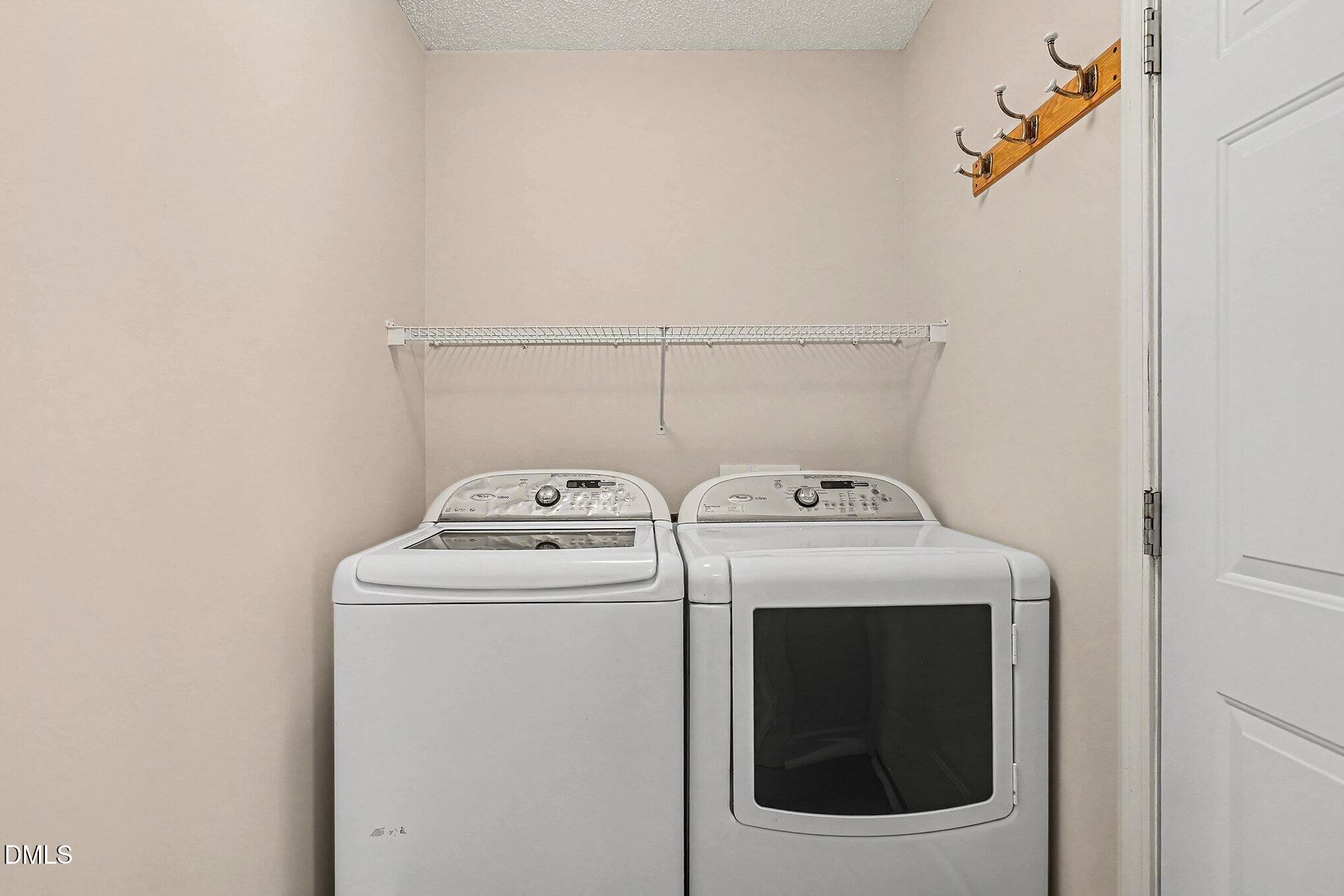 5017 Tapestry Terrace Durham, NC 27713 - Photo 24 of 28 a utility room with dryer and washer