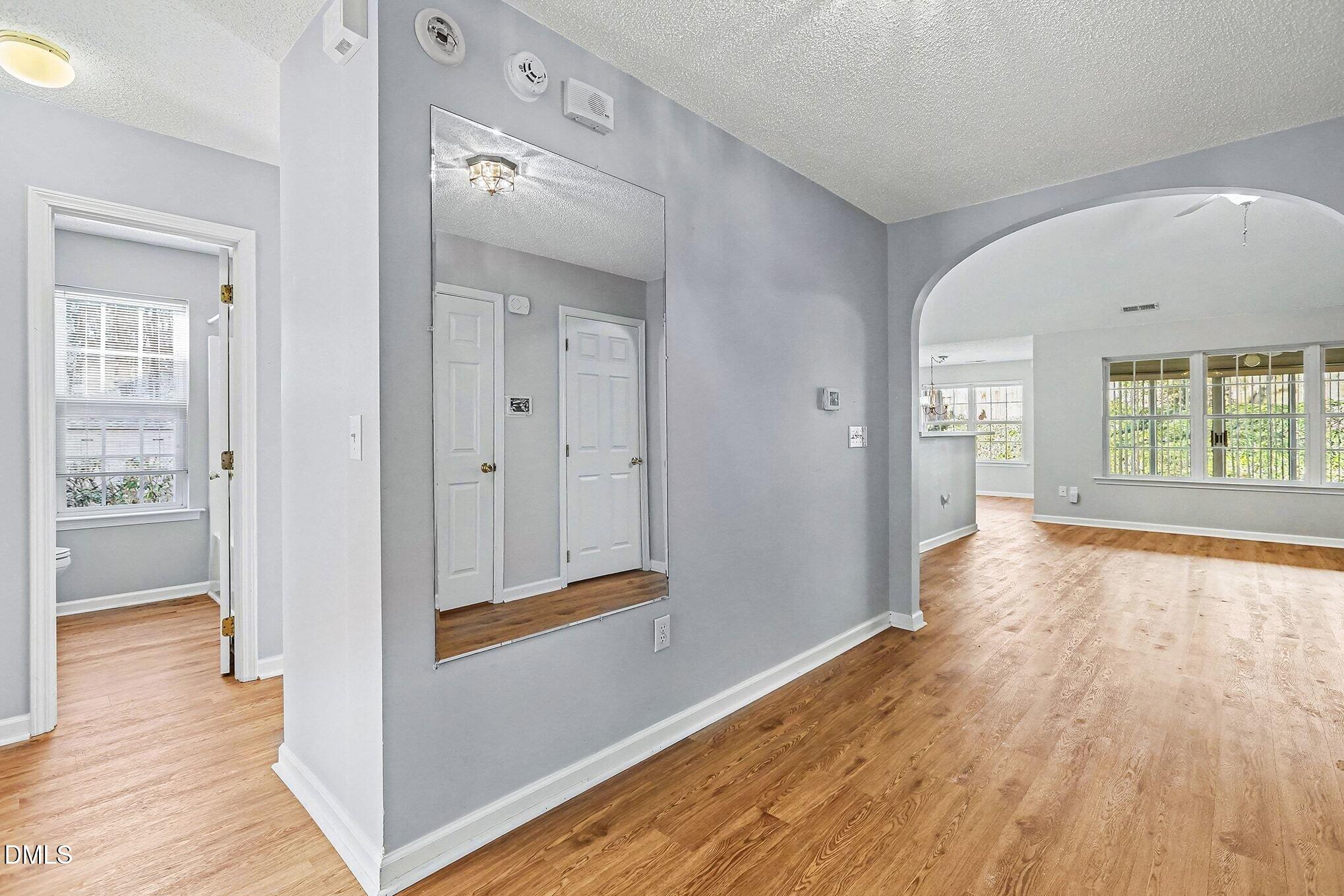 5017 Tapestry Terrace Durham, NC 27713 - Photo 4 of 28 wooden floor with a window