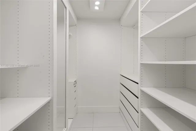 a view of an empty walk in closet