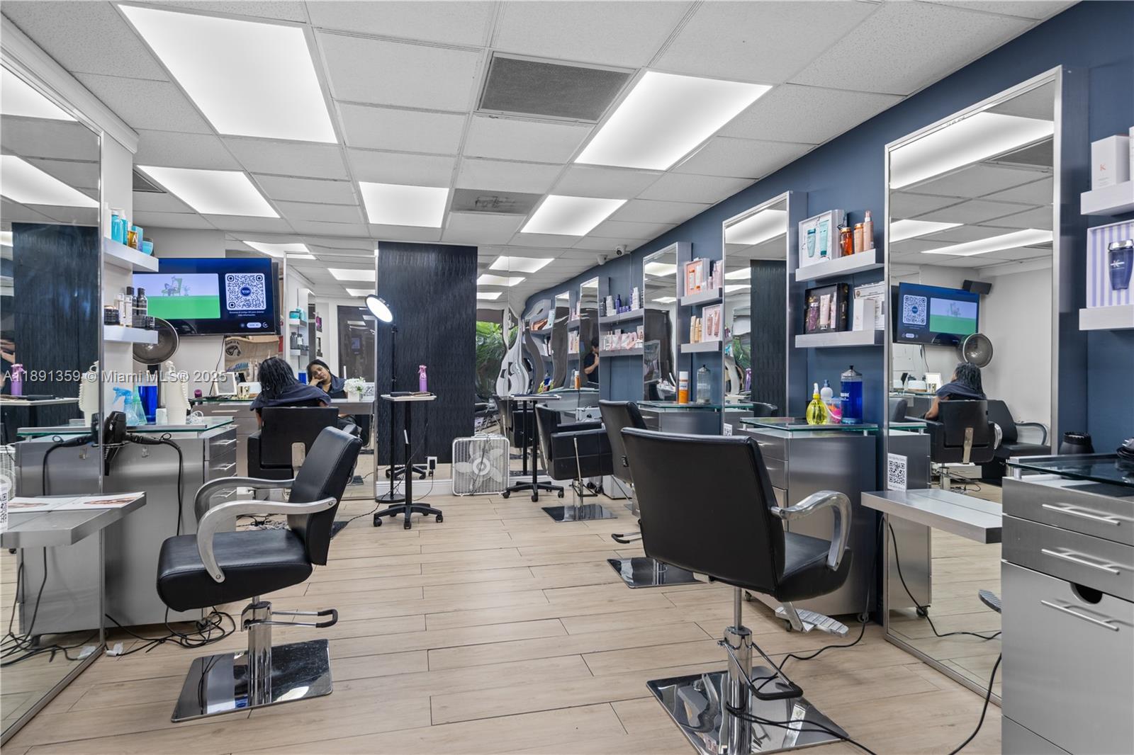101 Crandon Boulevard, Unit 379 Key Biscayne, FL 33149 - Photo 24 of 37 a living room with lots of furniture and clutter