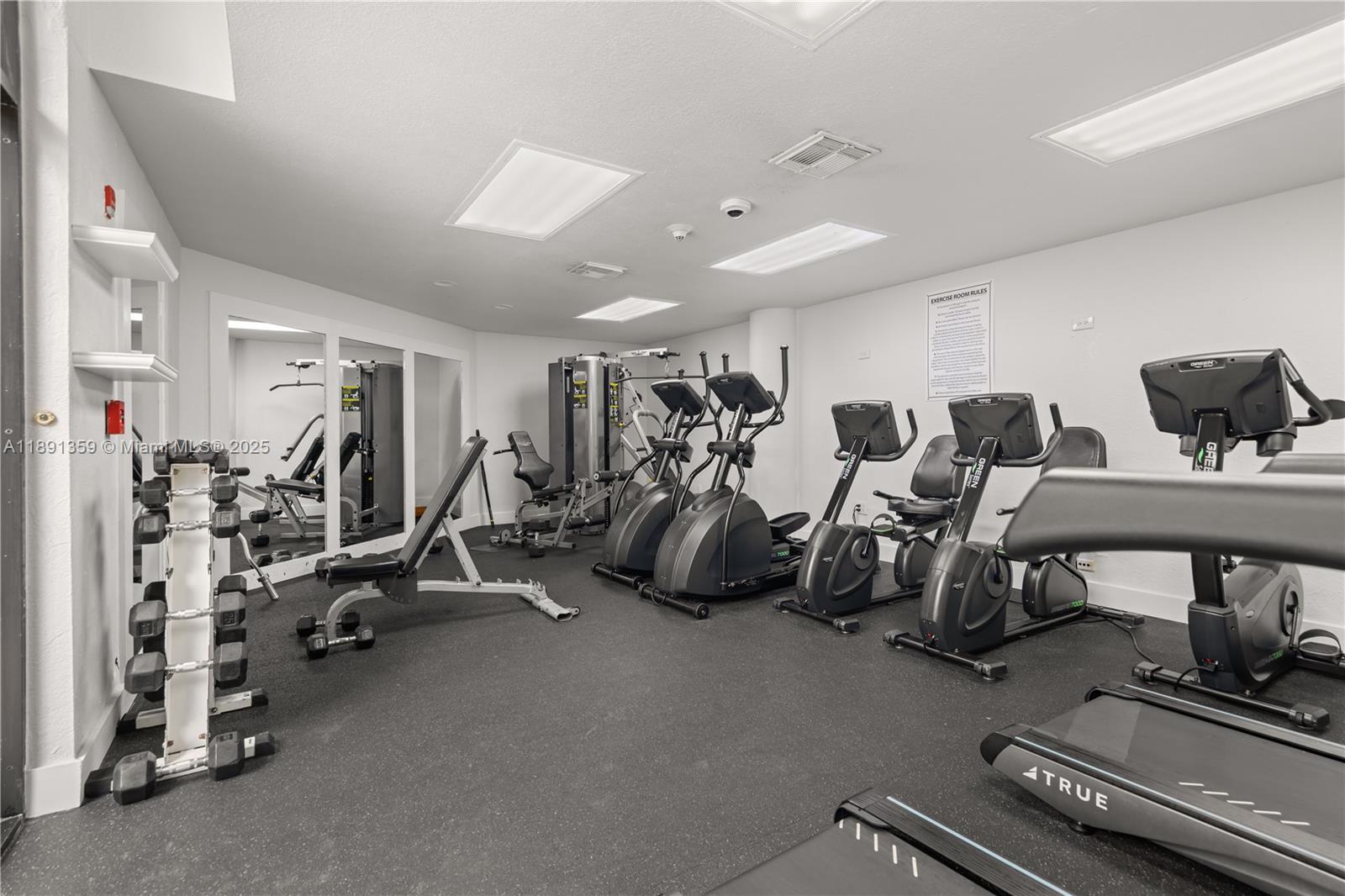 101 Crandon Boulevard, Unit 379 Key Biscayne, FL 33149 - Photo 25 of 37 a view of a room with gym equipment
