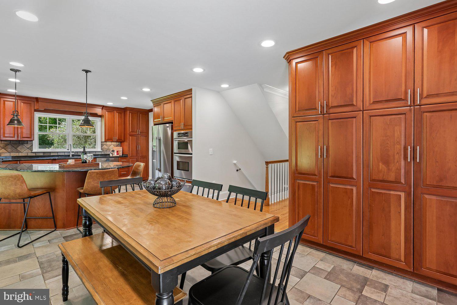 20920 Sunnyacres Road Gaithersburg, MD 20882 - Photo 18 of 64 Breakfast area with wall-to-wall pantry storage