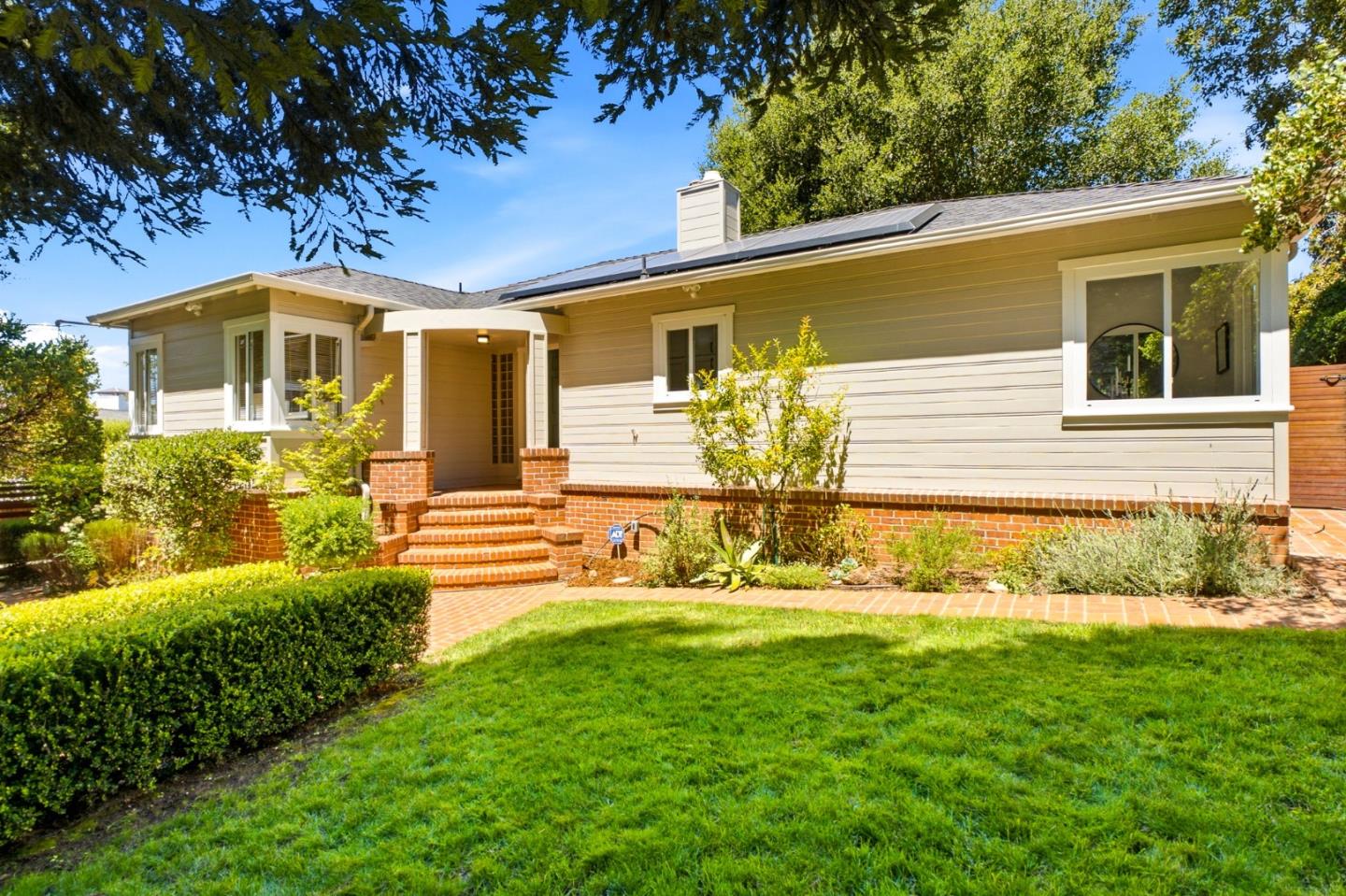 9858 Golf Links Road Oakland, CA 94605 - Photo 38 of 39 a front view of a house with a yard