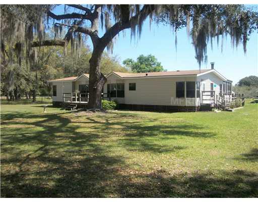 Exterior Front - Look close for tree swing and birdbath
