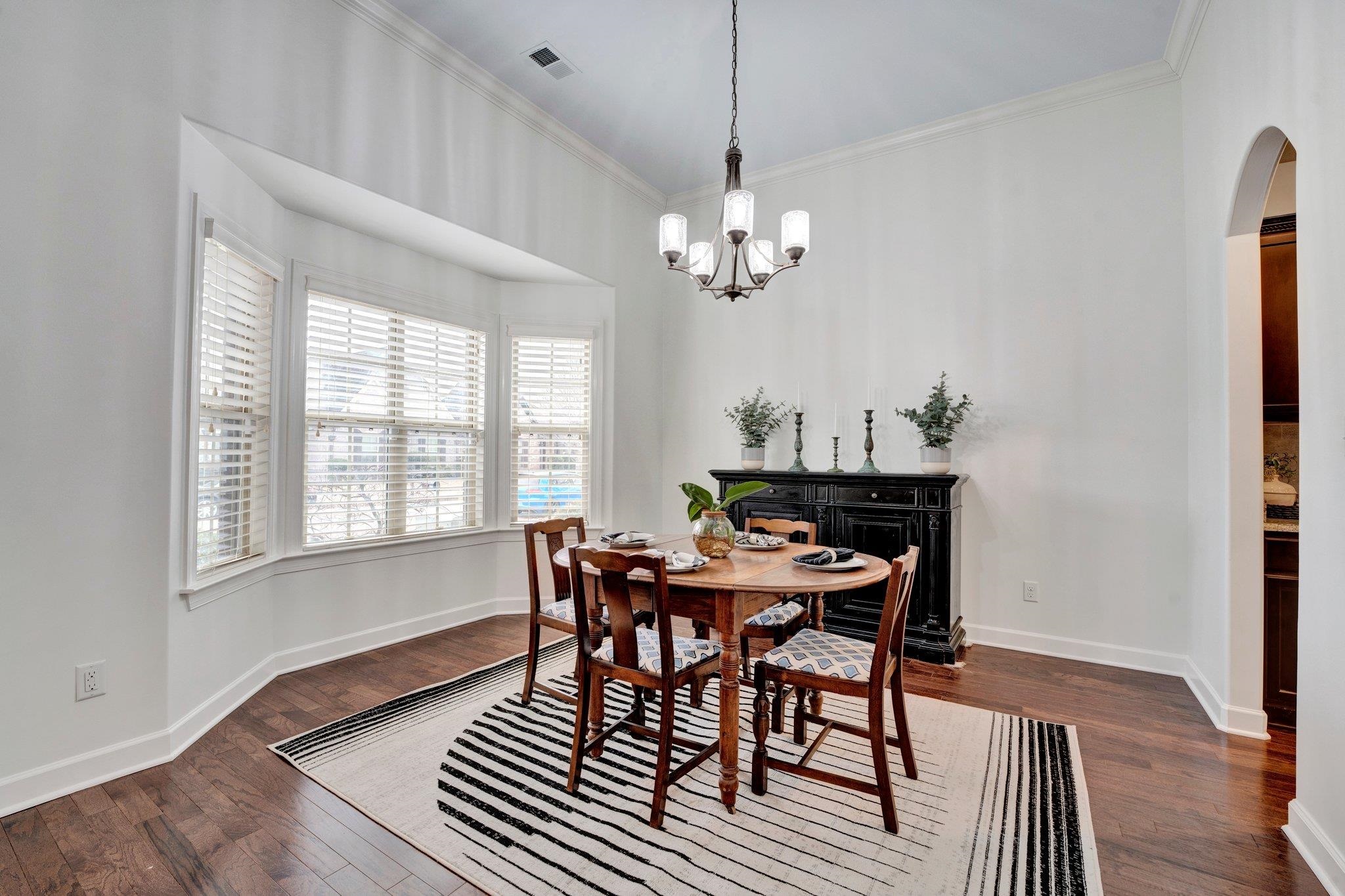 1965 Rochelle Lane Cordova, TN 38016 - Photo 2 of 40 a view of a dining room with furniture window and wooden floor