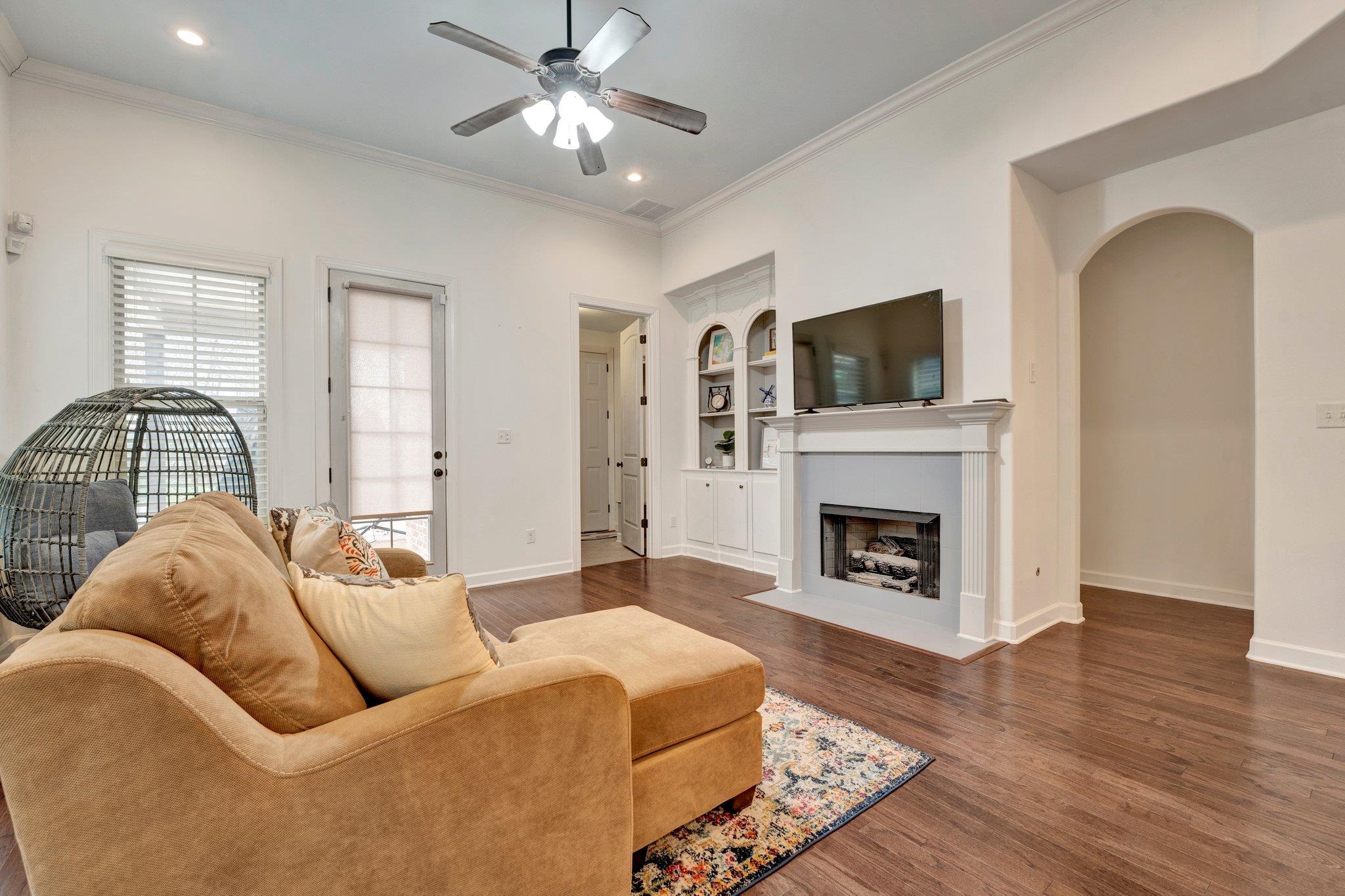 1965 Rochelle Lane Cordova, TN 38016 - Photo 21 of 40 a living room with furniture fireplace and flat screen tv