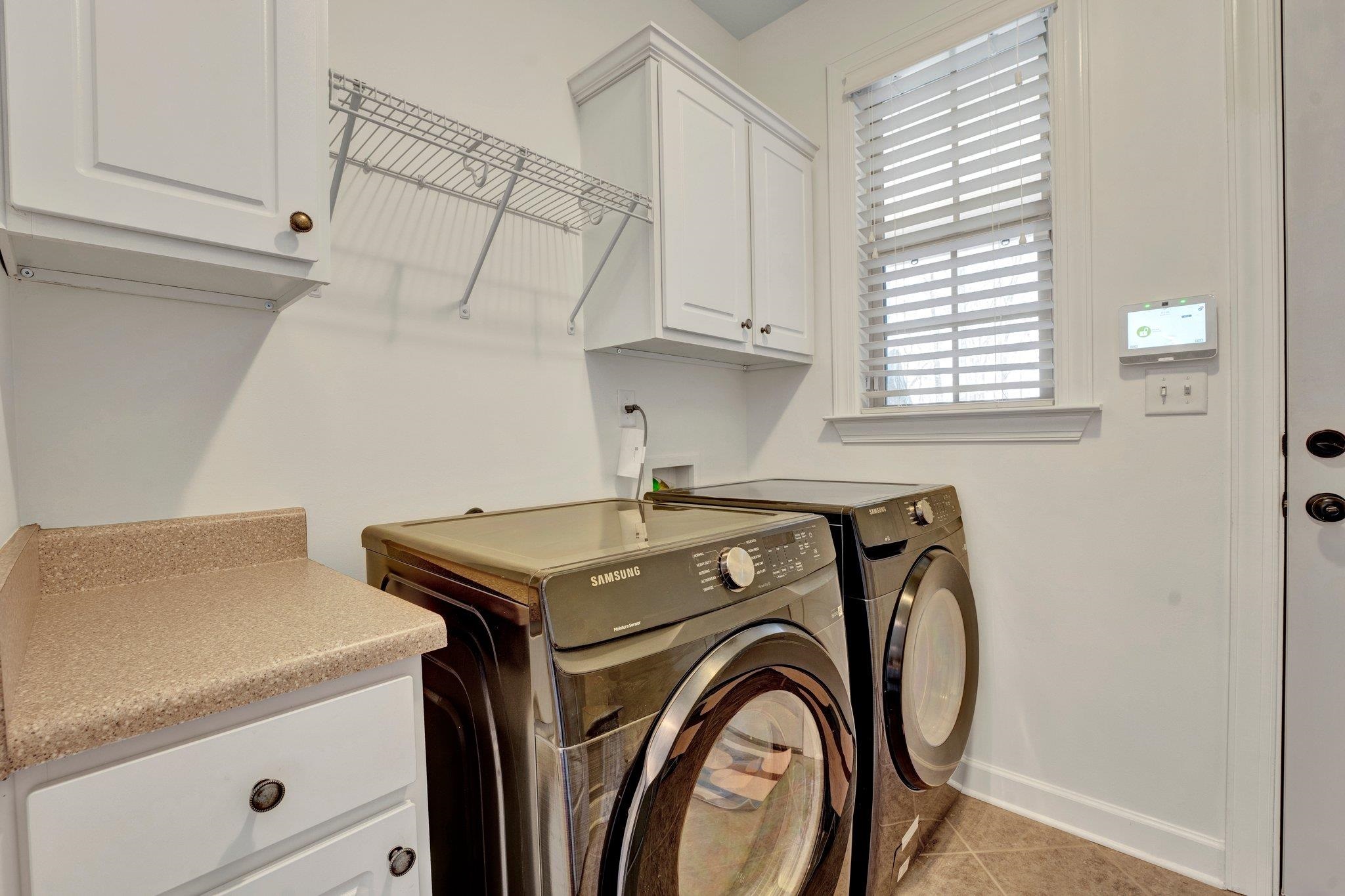 1965 Rochelle Lane Cordova, TN 38016 - Photo 22 of 40 a utility room with dryer and washer
