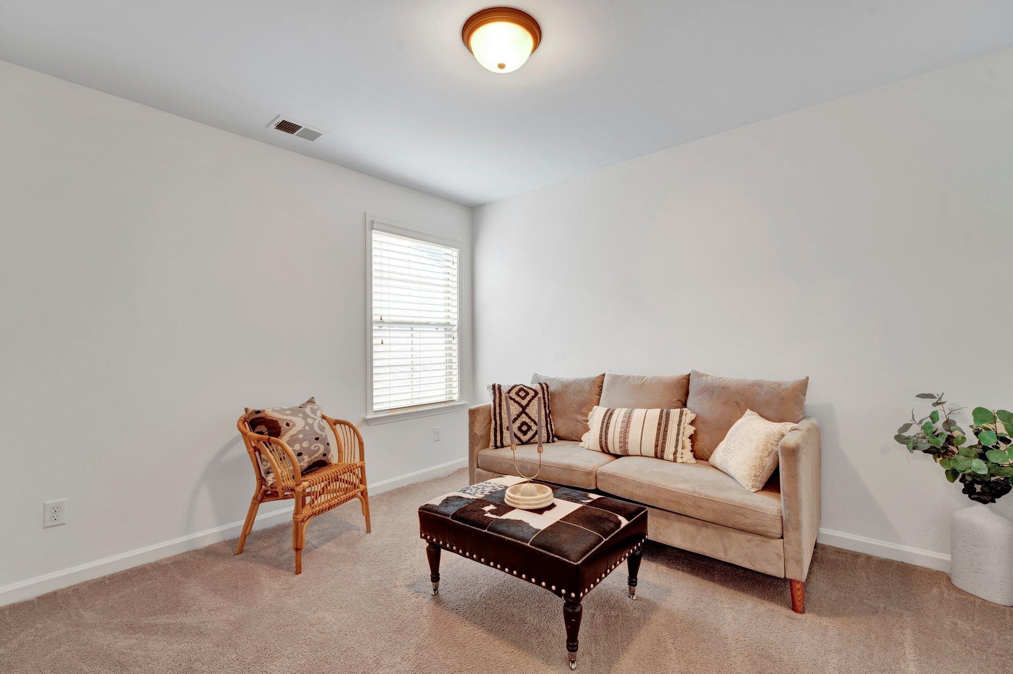 1965 Rochelle Lane Cordova, TN 38016 - Photo 35 of 40 a living room with furniture and a window