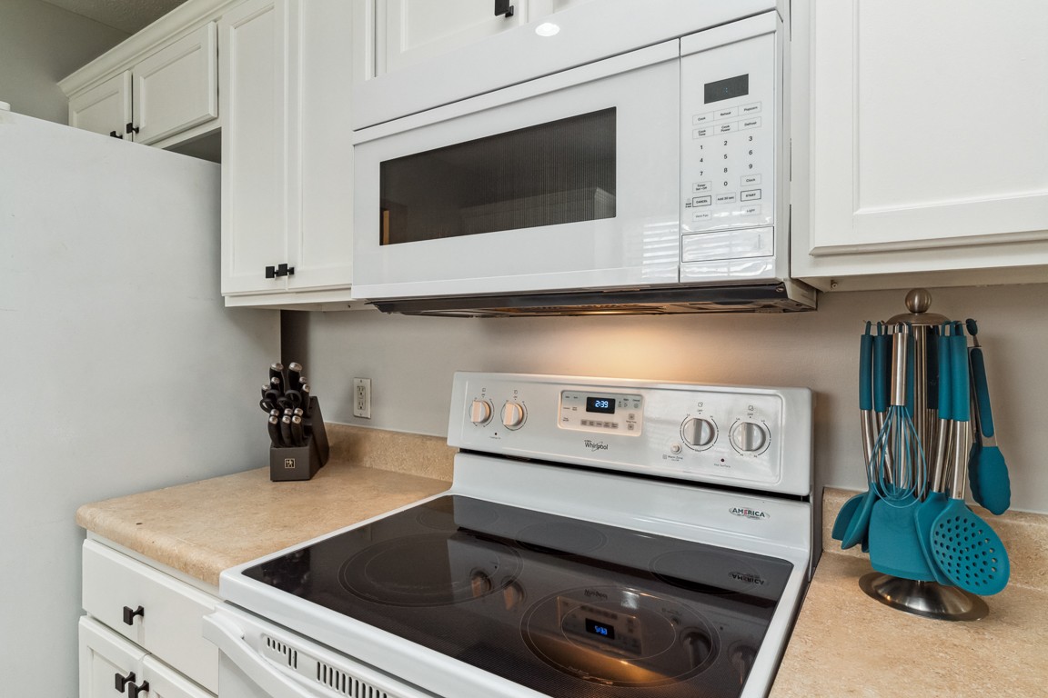 497 Puckett Road Watertown, TN 37184 - Photo 11 of 27 a kitchen with a stove and a microwave