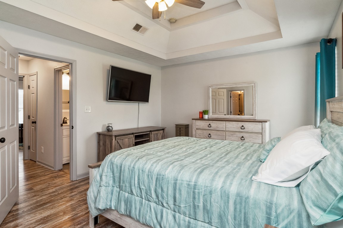 497 Puckett Road Watertown, TN 37184 - Photo 13 of 27 a bedroom with a bed and a flat screen tv