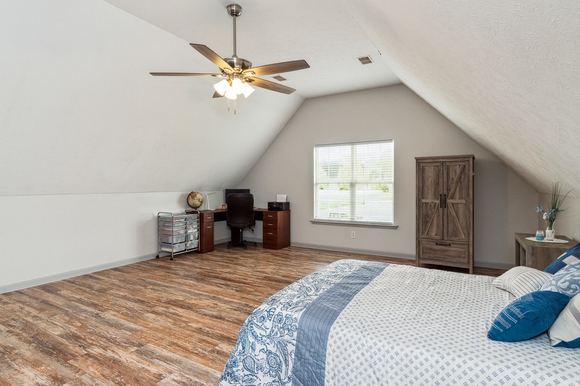 497 Puckett Road Watertown, TN 37184 - Photo 16 of 27 a bedroom with a bed and ceiling fan