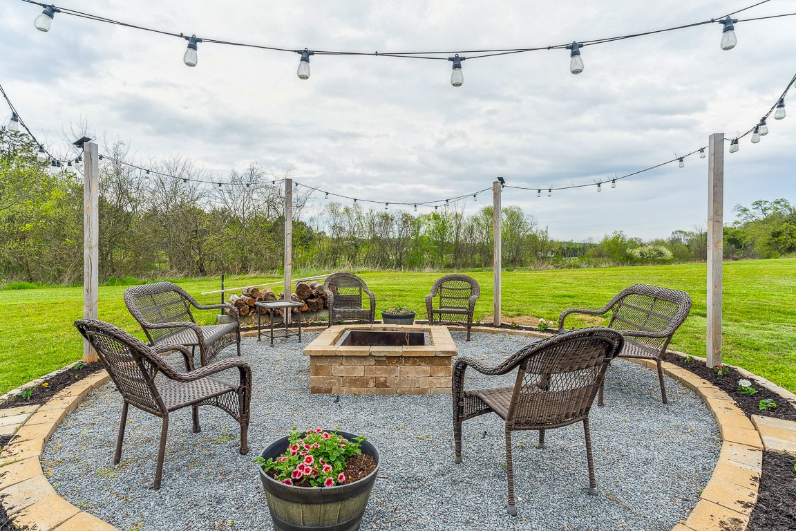 497 Puckett Road Watertown, TN 37184 - Photo 24 of 27 a roof deck with table and chairs