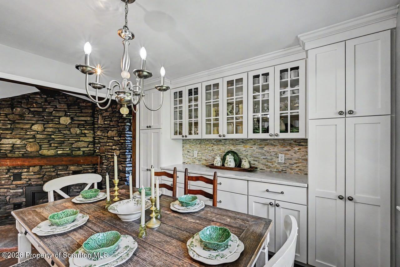 719 Scott Road Clarks Summit, PA 18411 - Photo 13 of 51 a kitchen with a table and chairs in it