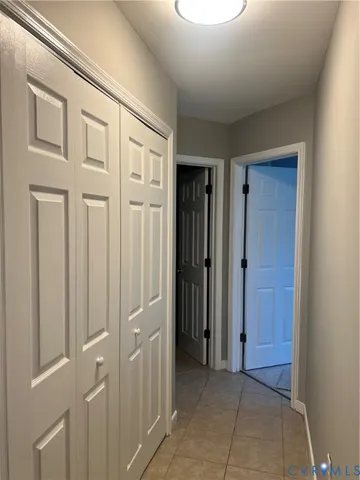 a view of a two chairs in the balcony