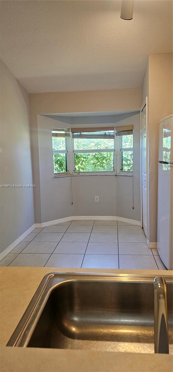 2910 Southeast 12th Road, Unit 20429 Homestead, FL 33035 - Photo 6 of 16 a view of parking area