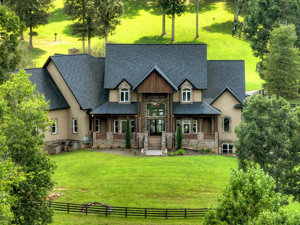 280 Star Creek Crossing Morganton, GA 30560 - Photo 12 of 100 a front view of a house with garden