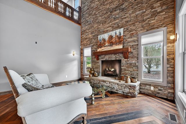 a bedroom with a bed flat screen tv and a walk in closet