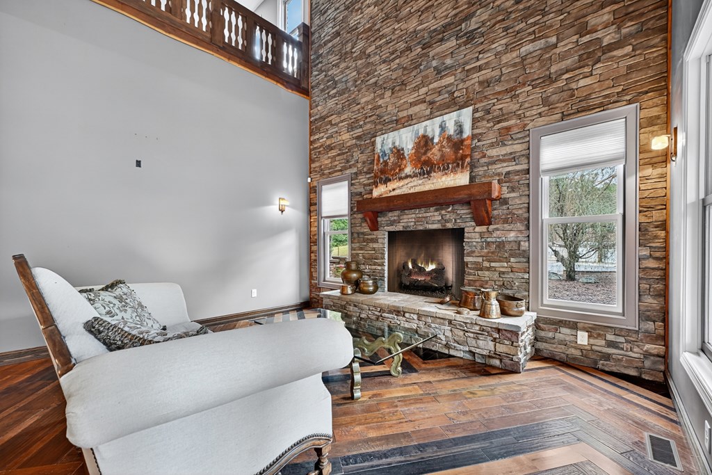 280 Star Creek Crossing Morganton, GA 30560 - Photo 19 of 100 a living room with furniture and a fireplace