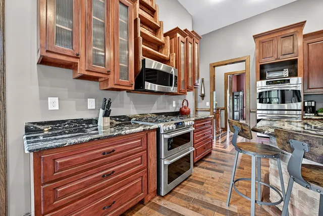 a view of a bedroom with washer and dryer