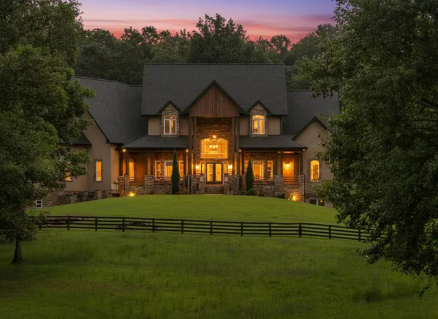 a view of a garden with a bench in the patio