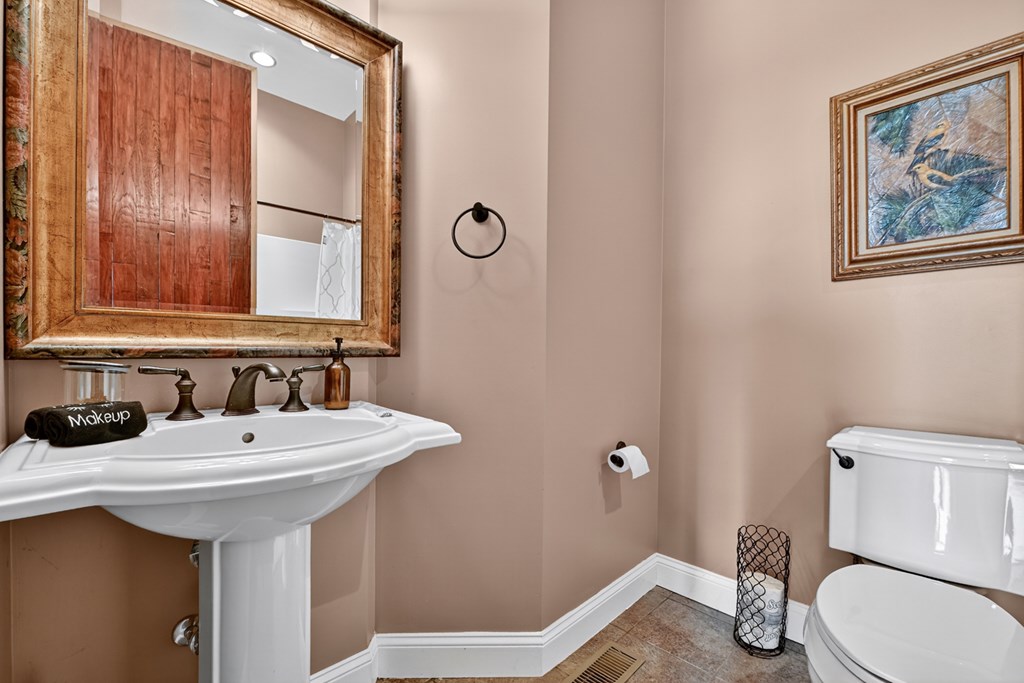 280 Star Creek Crossing Morganton, GA 30560 - Photo 53 of 100 a bathroom with a sink and a mirror
