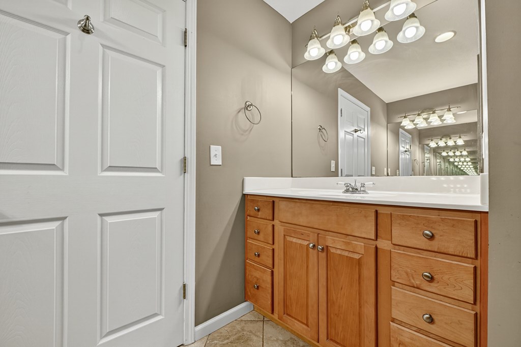 280 Star Creek Crossing Morganton, GA 30560 - Photo 75 of 100 a bathroom with a sink vanity and a mirror