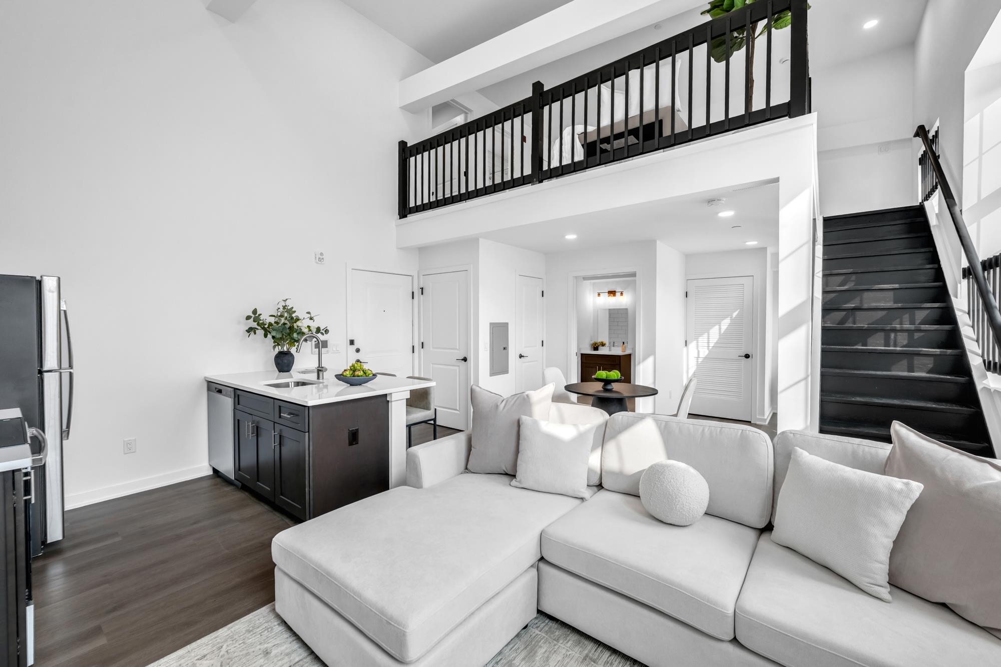315 Railroad Avenue, Unit 108 East Rutherford, NJ 07073 - Photo 1 of 28 a living room with furniture