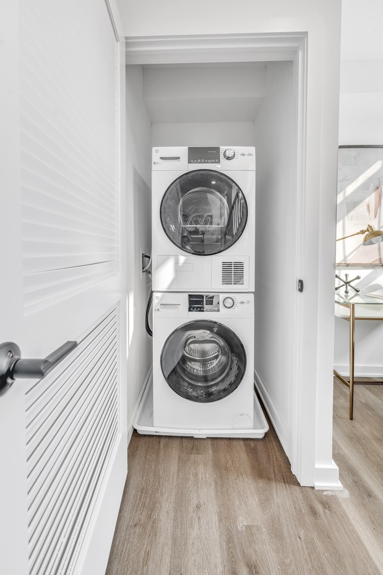 315 Railroad Avenue, Unit 108 East Rutherford, NJ 07073 - Photo 21 of 28 a utility room with dryer and washer