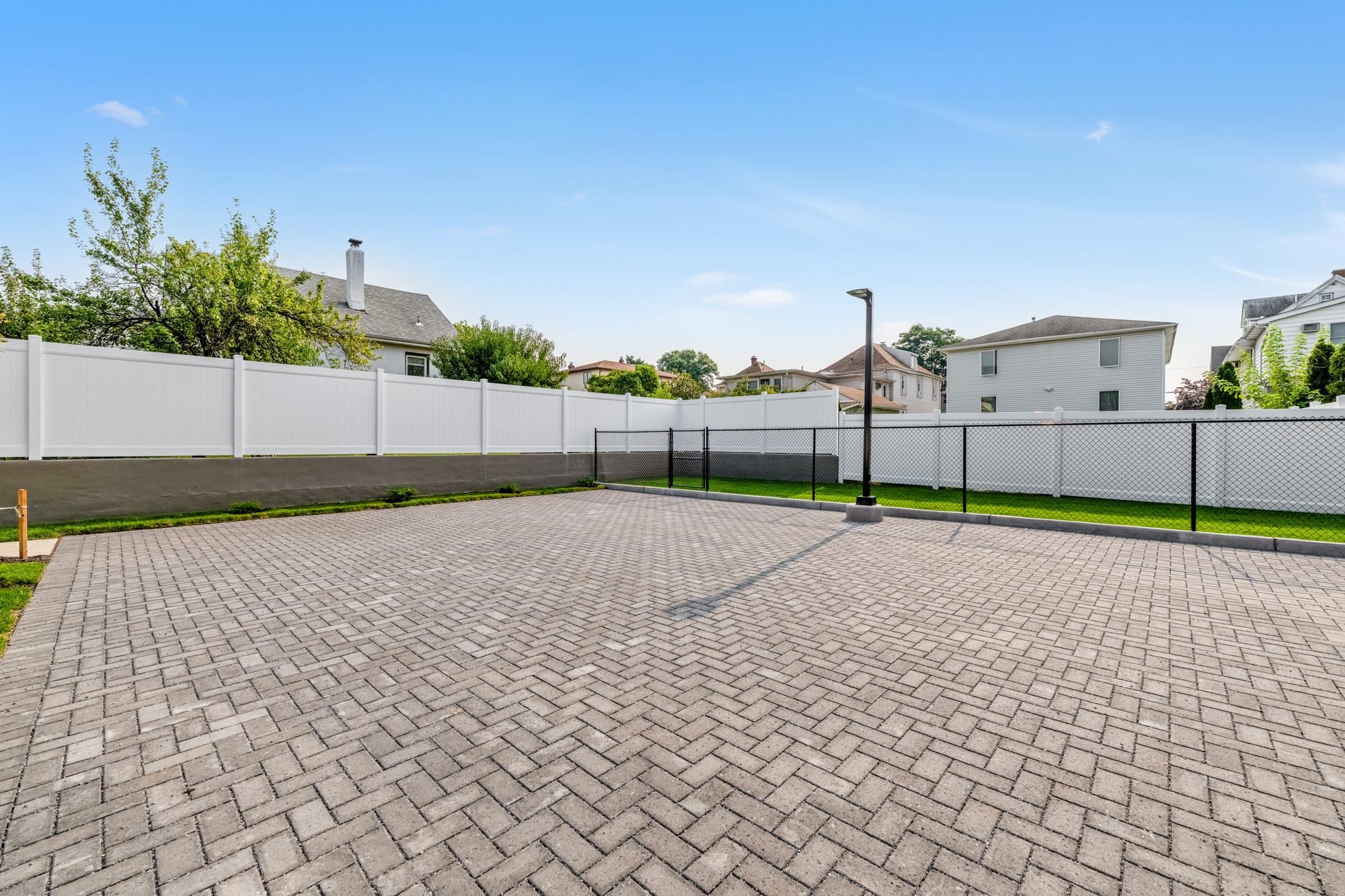 315 Railroad Avenue, Unit 108 East Rutherford, NJ 07073 - Photo 22 of 28 a view of a backyard